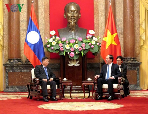 President Tran Dai Quang receives Laos NA Vice Chair - ảnh 1